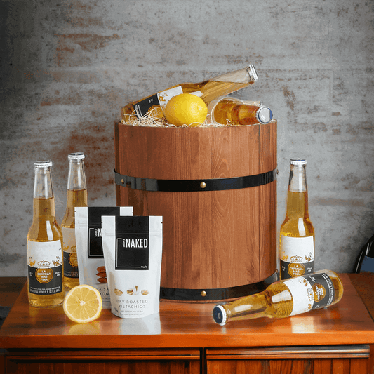 This comes with six Corona beers, two lemons for serving, dry roasted pistachios, sea salt almonds all packed into a wooden gift barrel perfect for giving for a birthday gift, thank you gift, or just because