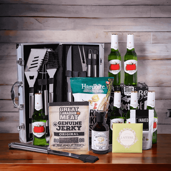 Included in this gift are chipotle raspberry parsnip chips, a bar of chocolate, dry roasted pistachios, classic beef jerky, sweet bourbon grilling sauce, a complete grilling tool set, and six beers packed into a beverage box. 
