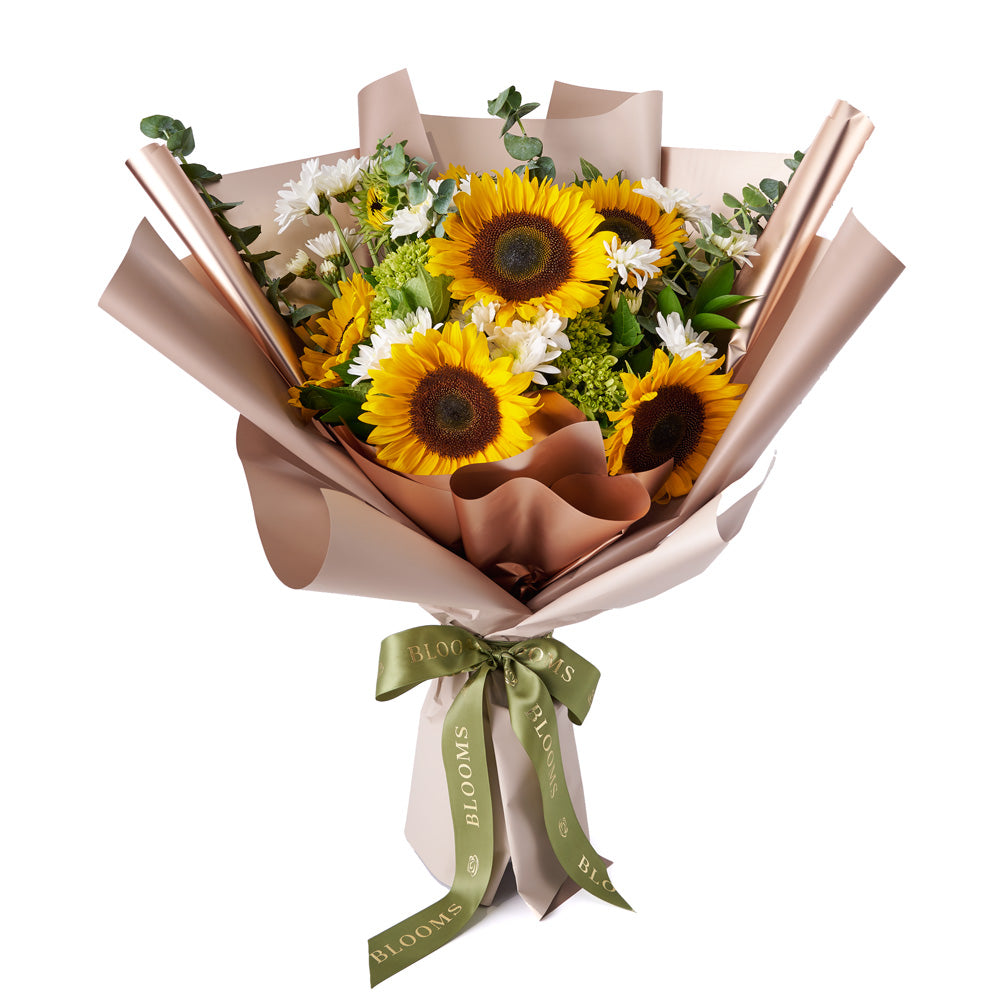 Few things are as charming and radiant as sunflowers, which is why the Eternal Sunshine Sunflower Bouquet from Hops Collective Canada