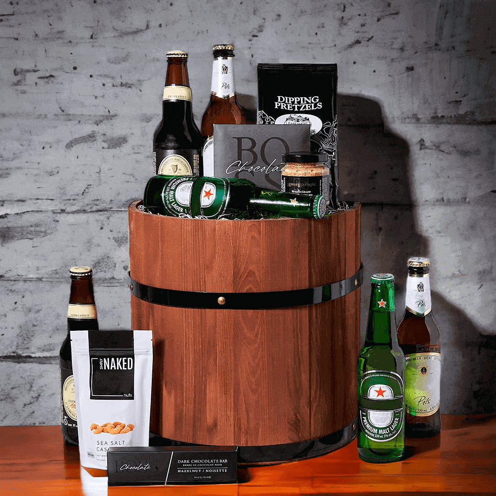 Highlights of this gift include chocolate, a dark chocolate hazelnut bar, sea salt cashews, whole grain garlic mustard, pretzels, a wooden gift barrel, and last but not least, six bottles of beer. 